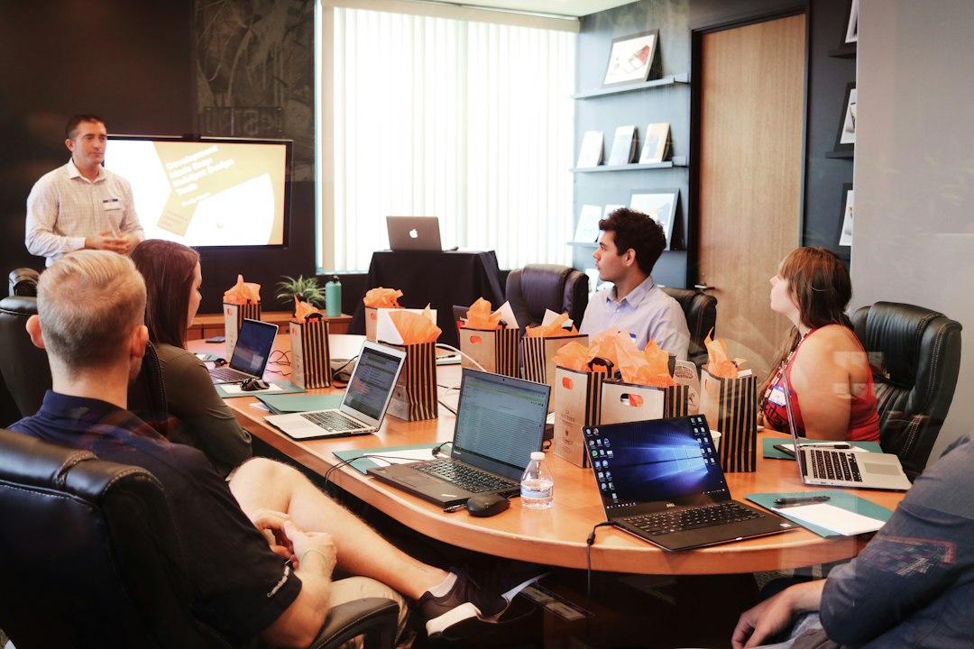 Business team practicing a presentation in a collaborative workshop